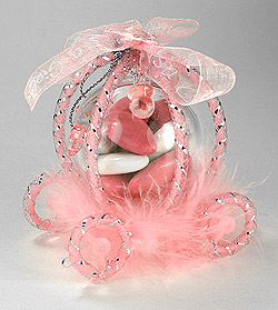 Carrosse rose avec Boule sur lit de plumes